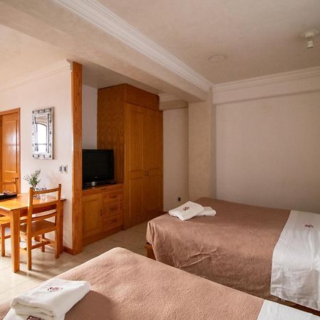 Suites Sevilla Пуебла Екстериор снимка
